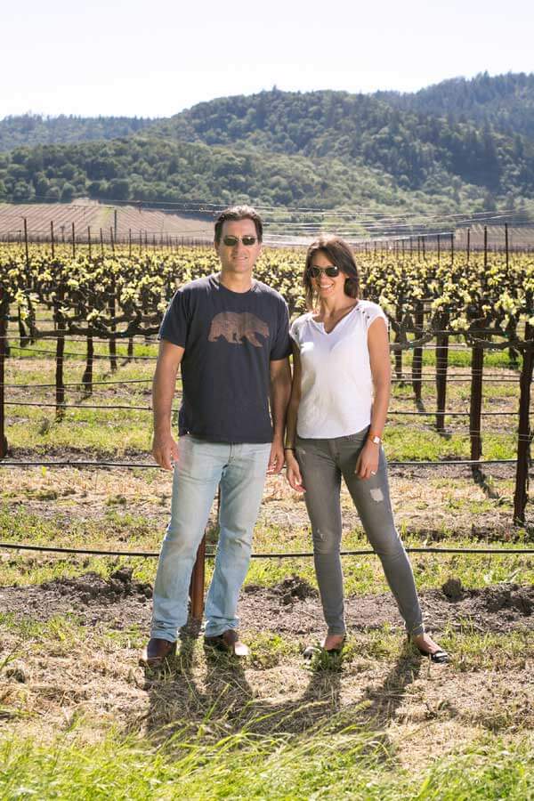 Tom and Roma in the vineyard.